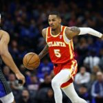 Atlanta Hawks guard Dejounte Murray (5) drives to the basket against the Orlando Magic during the first quarter at Kia Center.