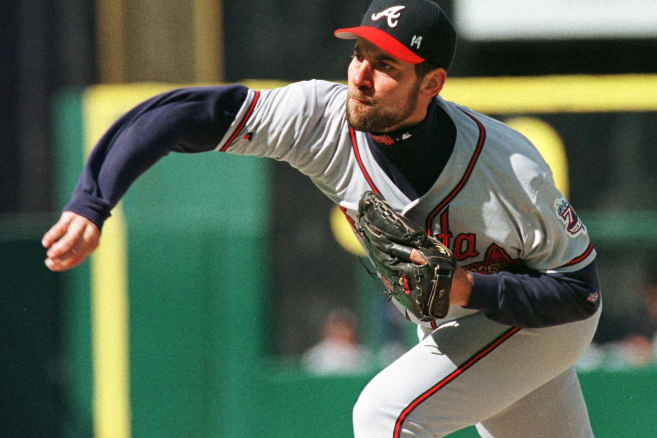 Atlanta Braves pitcher John Smoltz follows through