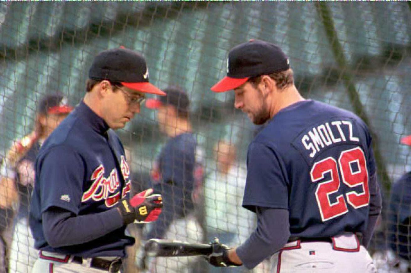 Atlanta Braves pitchers Greg Maddux (L) and John